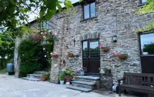 crooked barn front view